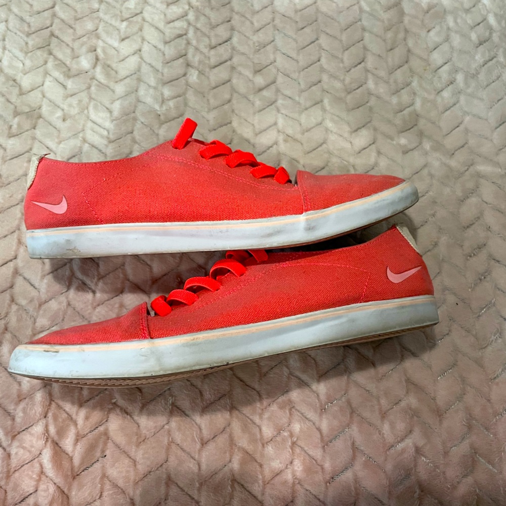 Nike slip-on coral sneakers